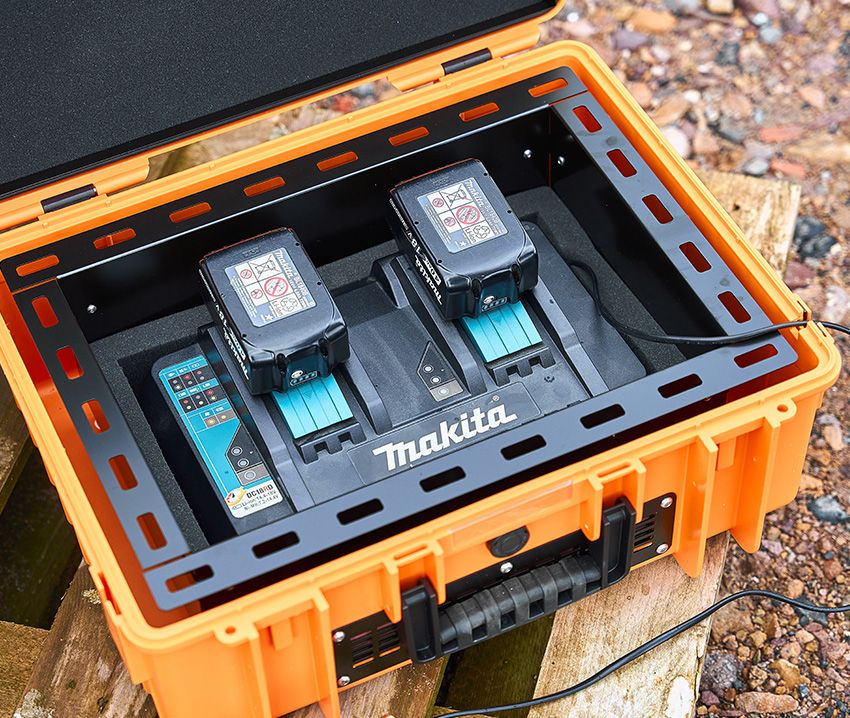 Interior view of the battery case with batteries.